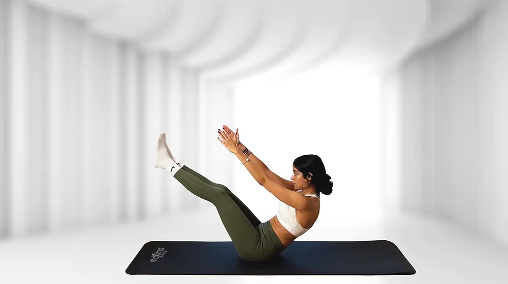 Mat Pilates exercise in a bright room, from Natalia Pilates